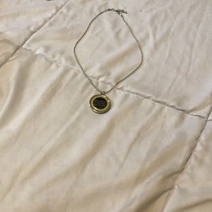 Neclase with a saying